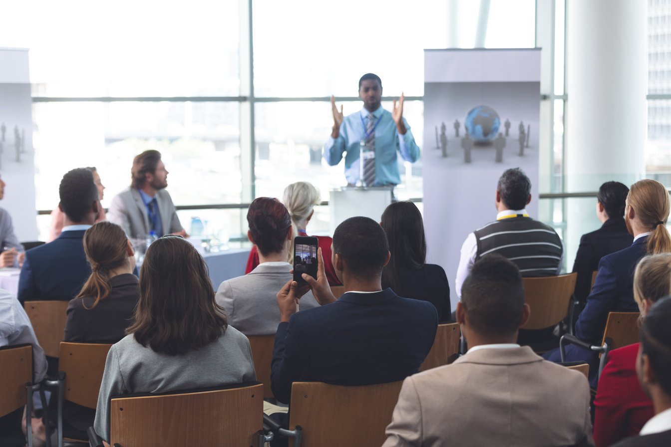 Male speaker speaks in a business seminar